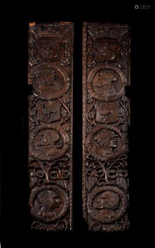 A RARE PAIR OF EARLY HENRY VIII CARVED OAK PANELS, CIRCA 151...