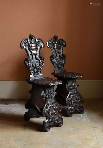 A PAIR OF ITALIAN CARVED WALNUT SGABELLO CHAIRS, LATE 16TH/E...