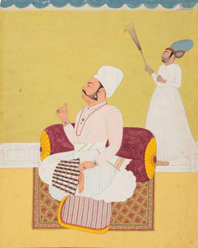 A prince seated on a terrace