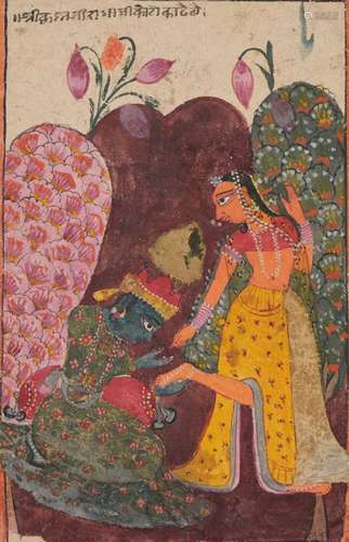 Krishna plucking a thorn from Radha's foot