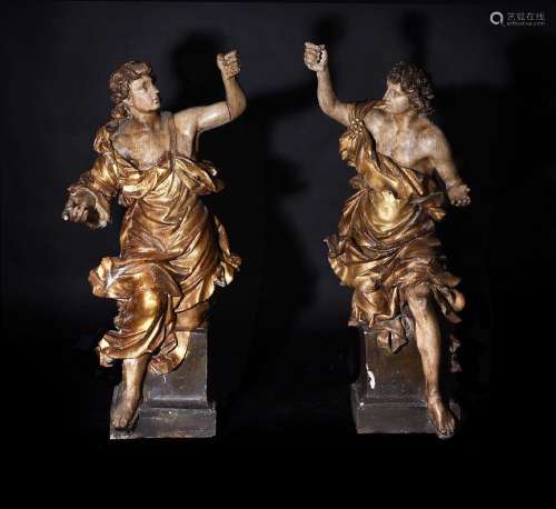 A LARGE PAIR OF FRANCO-ITALIAN CARVED, GILDED AND POLYCHROME...