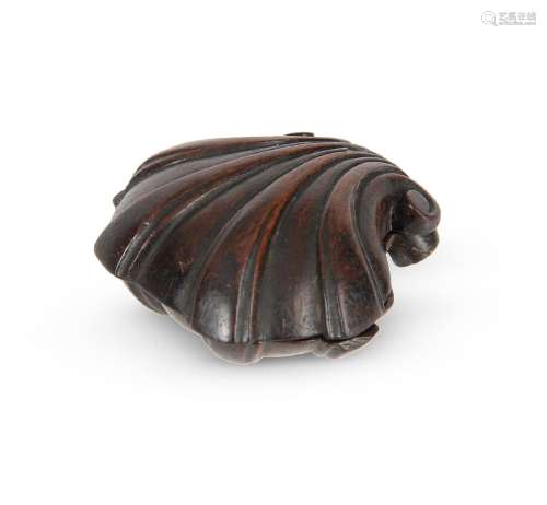 A GEORGE II CARVED MAHOGANY SCALLOP SHELL TABLE SNUFF MULL, ...