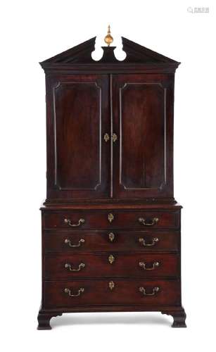 A GEORGE III MAHOGANY CABINET ON CHEST, IN THE MANNER OF THO...