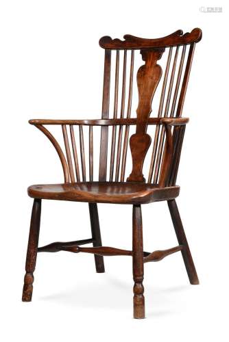 A FRUITWOOD, ELM AND BEECH COMB BACK WINDSOR ARMCHAIR, SECON...