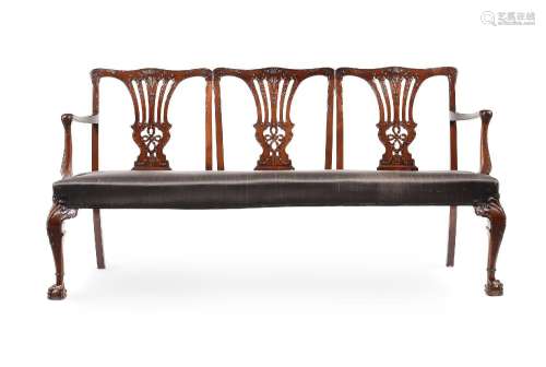 A CARVED MAHOGANY CHAIR BACK SETTEE, IN GEORGE III STYLE, 19...