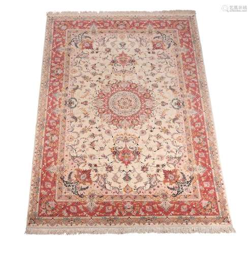 A TABRIZ CARPET, of Naksh design, approximately 316 x 203cm