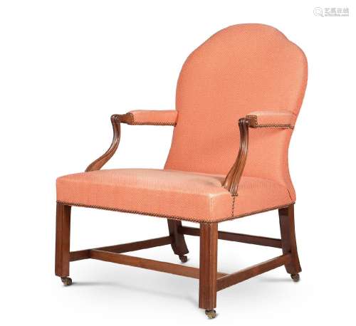 A GEORGE III MAHOGANY LIBRARY ARMCHAIR, OF GAINSBOROUGH TYPE...
