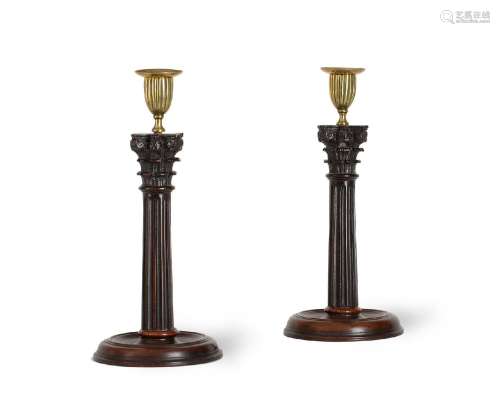 A PAIR OF GEORGE III MAHOGANY CANDLESTICKS, PROBABLY SCOTTIS...