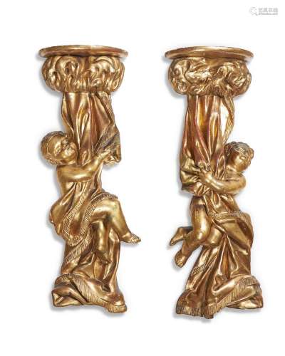 A PAIR OF ITALIAN CARVED GILTWOOD WALL MOUNTS, 18TH CENTURY ...