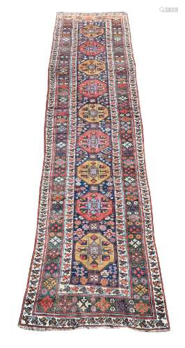 A NORTH WEST PERSIAN RUNNER, approximately 448 x 92cm