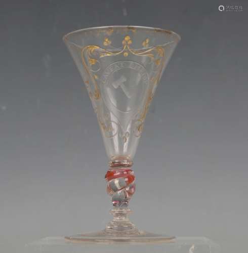 An engraved drinking glass, early 19th century, the trumpet ...