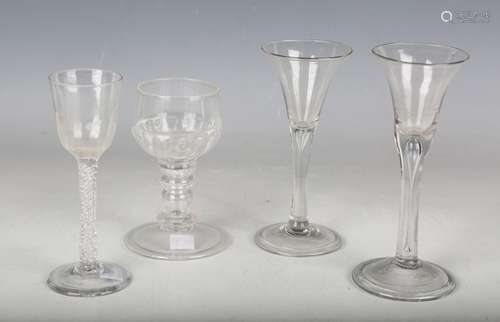 Two plain stem wine glasses, circa 1740, both with teared st...