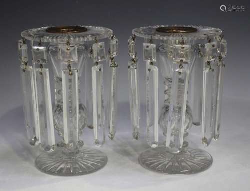 A small pair of clear glass lustres, early 19th century, the...
