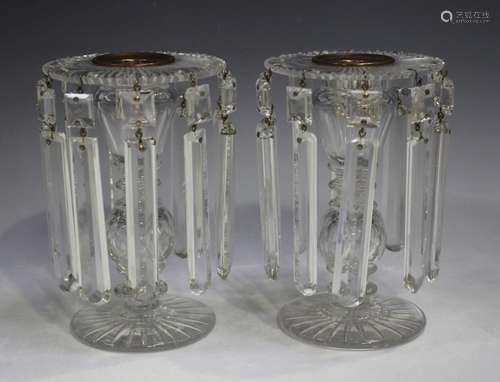 A small pair of clear glass lustres, early 19th century, the...