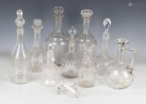 A mixed group of glass decanters and assorted stoppers, 19th...