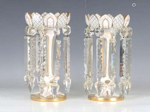A pair of white overlay and clear glass lustres, late 19th c...