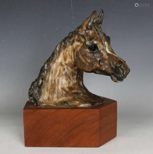 An Irene French pottery model of a horse's head, incised sig...