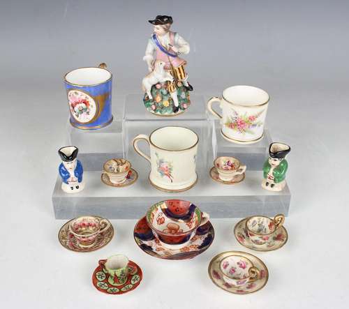 A Continental porcelain Chelsea style diminutive figural sce...