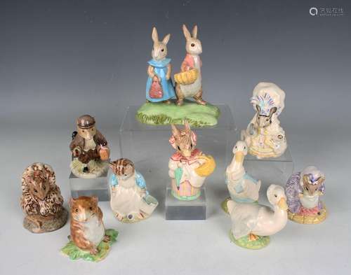 Ten Beatrix Potter figures, comprising six Royal Albert exam...