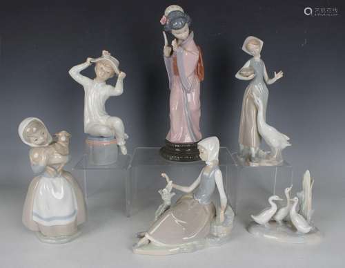 Four Lladro figures, comprising Timid Japanese, No. 4990, Gi...