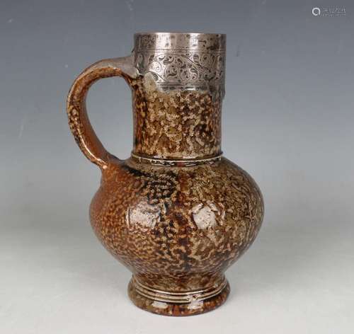 A silver mounted mottled tiger glaze stoneware jug, circa 16...