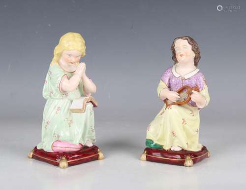 A pair of Stevenson & Hancock Derby porcelain figures, l...