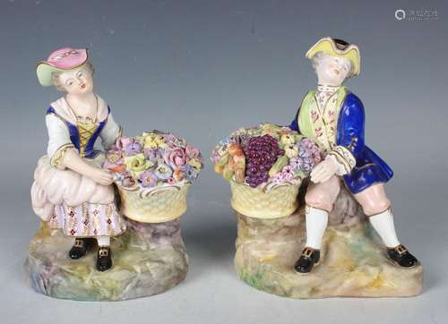 A pair of Stevenson & Hancock Derby porcelain figures, l...