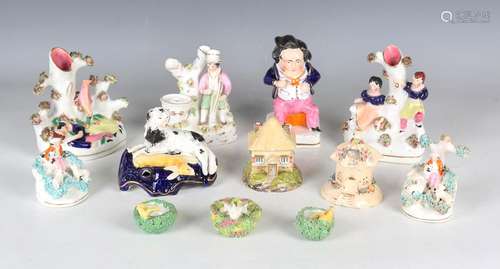 A small group of Staffordshire pottery and porcelaineous war...