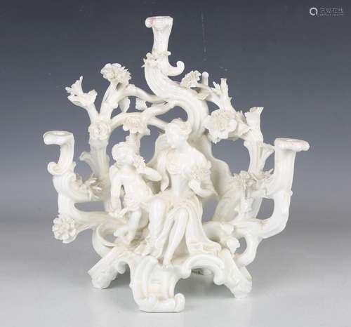 A Meissen style white glazed three-branch figural candelabru...