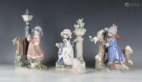 Three Lladro figures representing the seasons, comprising Gl...