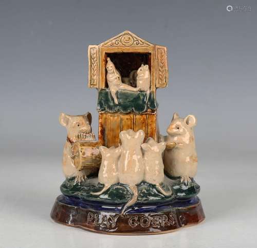 A Doulton Lambeth stoneware figure group 'Play Goer's', mode...