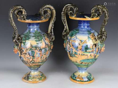 A large pair of Italian maiolica twin-handled snake vases, l...