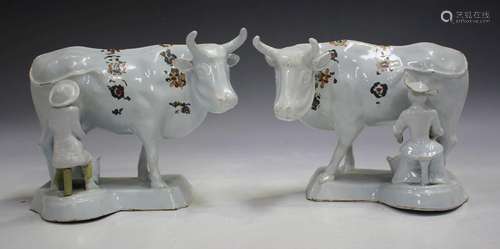 A pair of Dutch Delft models of cows with milkmaid and farm ...