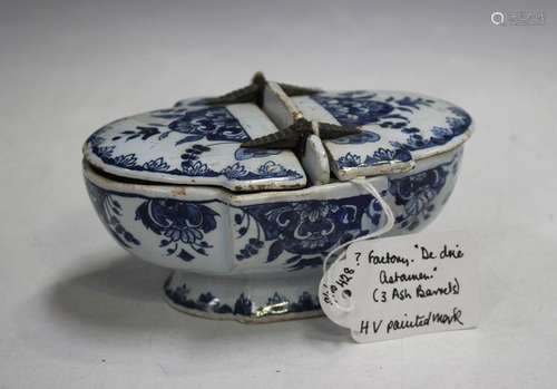 A Dutch Delft shaped oval box with two hinged lids, possibly...