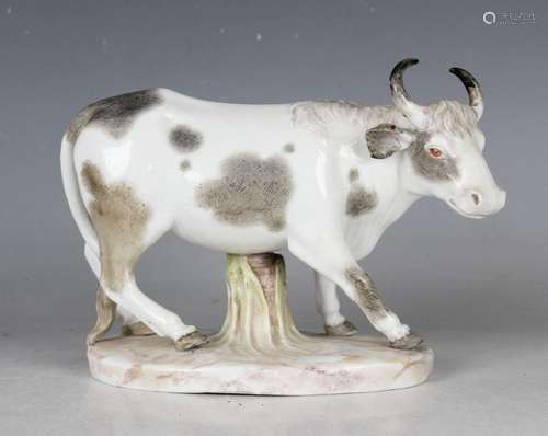 A Meissen style Continental porcelain model of a cow, 19th c...