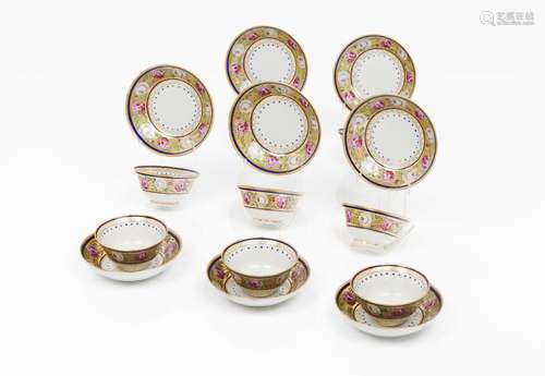 A set of eight cups and saucers