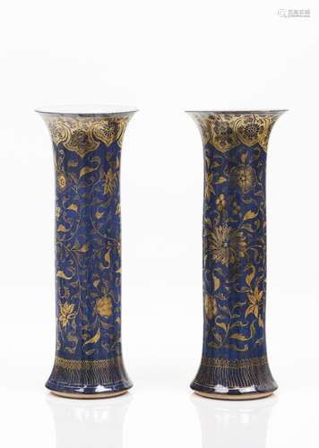 A pair of beaker vases