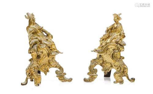 A pair of Louis XV style firedogs