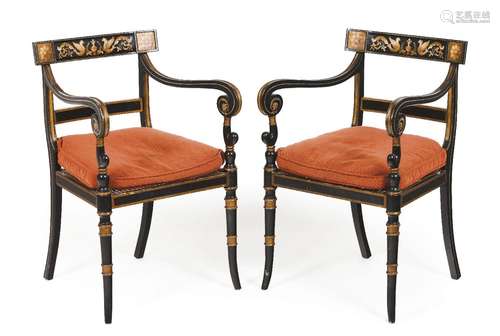 A pair of Regency style armchairs