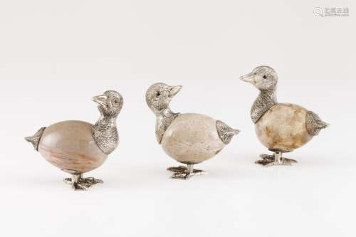 A group of three ducks
