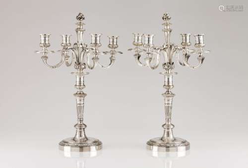 A pair of Christofle four branch candelabra
