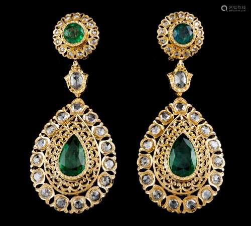 A pair of large Oriental earrings