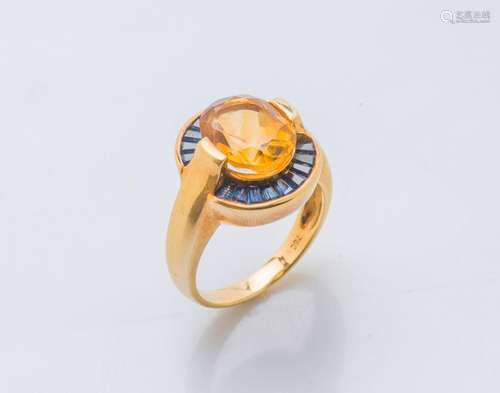 Bague en or jaune 18 carats (750 ‰) ornée d’une citrine oval...