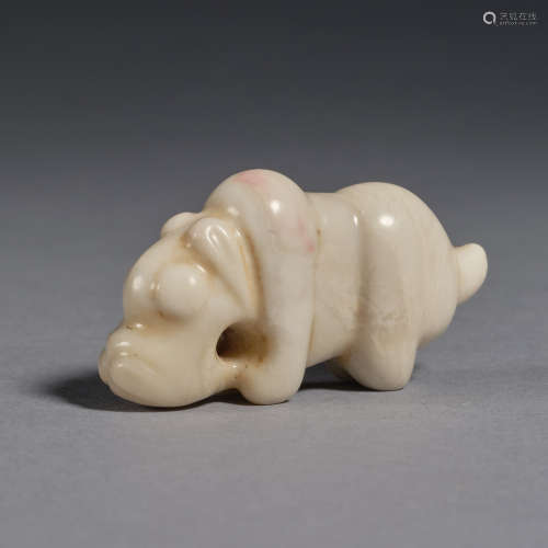 A calcified jade beast-shaped pendant Neolithic period, Hong...