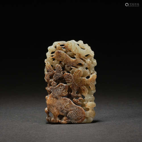 A reticulated white jade 'tiger in the forest ' plaque ,Liao...