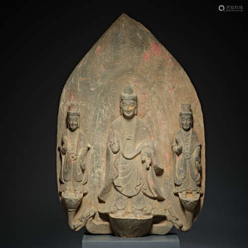 A  stone shrine depicting shakyamuni buddha