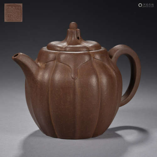 A Yixing 'pumpkin-shaped, multi-row' teapot and cover Qing d...