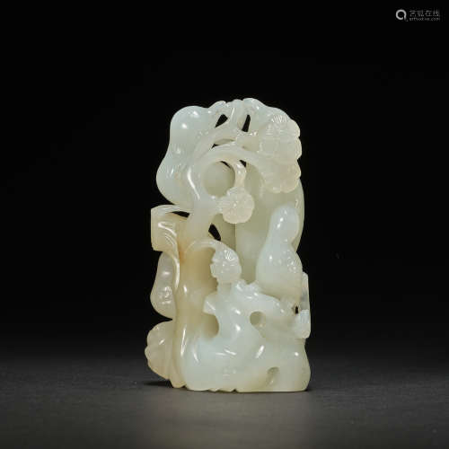 A white jade 'magpies in a plum tree' carving,Qing dynasty