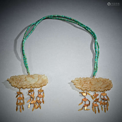 A pair of jade 'phoenix' pendants, Liao dynasty