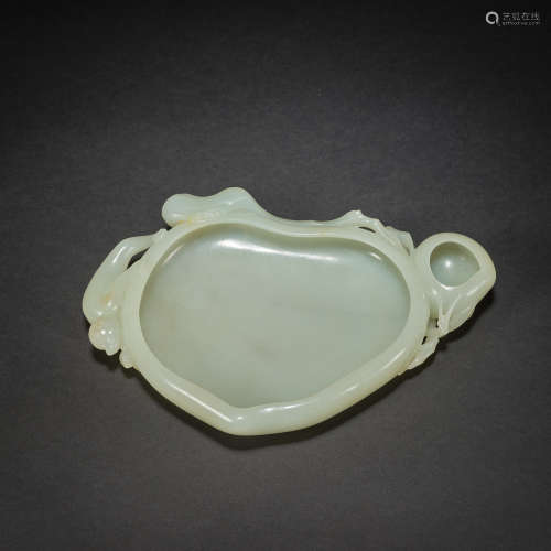 A rare white jade 'peaches and monkey' brush washer,Qing dyn...